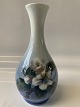 Royal 
Copenhagen Vase 
with tall 
slender neck, 
with Apple 
blossom
Dec. No. 53/51
1. ...