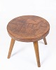 This antique 
stool is a 
specimen of 
fine 
craftsmanship, 
bearing a motif 
of a farmer 
with an ...
