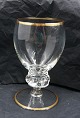 Gisselfeldt 
(Gisselfeld) 
with gold rim 
glassware by 
Holmegaard 
Glass-Works, 
Denmark.
Red wine ...