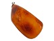 Large amber 
pendant.
Length 5.3 
cm., width 3.0 
cm.
Excellent 
condition.