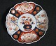 Imari plate. 
Japan, 19th 
century. 
Polycrom 
decoration on 
white base with 
gilding. 
Decorated with 
...
