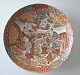 Satsuma Plate, 
Meji Period, 
Japan, 19th 
Century. 
Polycrom 
decorated with 
three men and 
gold. ...