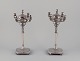 A pair of large 
and impressive 
Italian 
candlesticks in 
silver (800).
With lids.
Period: ...