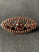Silver brooch 
from HGR in 830 
Silver.
Beautifully 
decorated with 
garnets for 
everyday life 
and ...