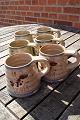 Knabstrup 
pottery & 
ceramics from 
Denmark.
6 mugs with a 
happy pig and 
in a good used 
...