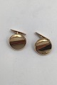 Hans Hansen 14K 
Gold Cuff Links 
Measures Diam 2 
cm (0.78 inch) 
Combined Weight 
14.5 gr (0.51 
oz)
