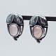 Georg Jensen; 
Heritage 
jewellery 2003. 
Earclips made 
of sterling 
silver set with 
rose ...