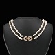 Two-Strand 
Pearl Necklace 
with 18k Gold 
Diamond lock.
Freshwater 
Cultured 
Pearls.
18k Yellow ...