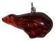 Amber pendant 
shaped like a 
polar bear with 
silver 
mounting.
The amber 
piece measures 
3.5 by ...