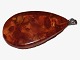 Amber pendant 
with silver 
mounting.
The amber 
piece measures 
3.4 by 1.7 cm.
Excellent ...