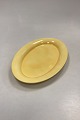 Royal 
Copenhagen 
Ursula Oval 
Plate in Yellow 
 No. 624
Measures 33 cm 
/ 12.99 in. 
Light traces 
...