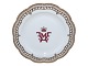 Royal 
Copenhagen 
Flora Danica, 
round platter. 
The platter is 
decorated with 
a crowned 
monogram ...