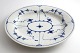 Royal 
Copenhagen. 
Mussel painted, 
fluted. Oval 
serving dish. 
(Model 96). 
Length 26 cm. 
Width 21 ...