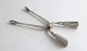 Georg Jensen. 
Bernadotte 
silver cutlery. 
Sterling (925). 
Sugar tongs. 
Length 11.5 cm.