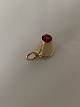 Pendant/charm for bracelet in 14 carat gold, with red stone.