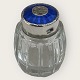 Salt shaker in 
glass, silver 
and enamel, 
Stamp: Meka 
Sterling 
Denmark, height 
4 cm, fine 
condition.