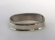 Georg Jensen. 
Sterling (925). 
Pyramid. Napkin 
ring. Model 
22A. Produced 
1933-1945