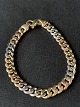 Beautiful 
panzer gold 
bracelet in 14 
carat red and 
white gold, 
with carabiner 
clasp. The ...