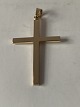 Cross pendant 
in 14 carats