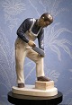 Bing & Grondahl 
porcelain 
figure of 
timber / 
carpenter.
Height: 26,5 
cm. Decoration 
number: ...