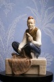 Bing & Grondahl 
porcelain 
figurine by 
tailor / 
designer. H: 
19cm. 
Decoration 
number: 2241. 
...