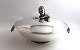 Georg Jensen. 
Sterling round 
dish with lid 
(925). Design, 
Georg Jensen. 
Model 408E. 
Diameter 24 cm.
