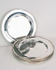 Set of 12 
charger plates 
in silver stain 
with pearl 
edge. Simple 
and classic 
design to suit 
any ...