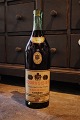 Decorative, old 
advertising 
Cognac bottle 
"Courvoisier - 
The brandy of 
Napoleon" in 
glass. The ...