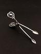 Georg Jensen 
Blossom sugar 
tong sterling 
silver 10 cm. 
stamp before 
1945 item no. 
590624