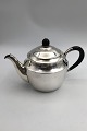 Evald Nielsen 
Silver Tea Pot 
(1925) Measures 
H 14 cm(5.51 
inch)  Diam 13 
cm (5.11 inch) 
Weight ...