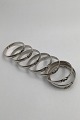 Jakob Skaarup 
Silver Napkin 
Ring Set (8) 
Numbered 1-8 
Measures Diam 
ca 3.6 cm (1.41 
inch)  ...
