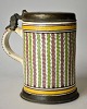 German faience 
beer mug with 
pewter lid, 
18th century.