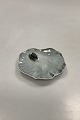 Royal 
Copenhagen dish 
Frog on 
Lillypad No 
2477. Measures 
10cm x 3cm. 
Designed by 
Erik Nielsen.
