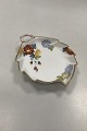 Royal 
Copenhagen No 
93. White Half 
Lace w. Flowers 
and Gold Leaf 
Large Shaped 
dish 
Measures  ...
