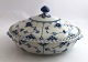 Royal 
Copenhagen. 
Blue fluted, 
full lace. 
Covered dish, 
oval. Model 
1129. Length 28 
cm. Width ...