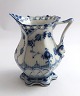 Royal 
Copenhagen. 
Blue fluted, 
full lace. 
Creamer. Model 
1032. (1 
quality). 
Height 10 cm.