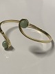 Flexible 
bracelet in 14 
carat gold with 
aventurines, 
which fills the 
arm nicely.
Inside ...