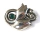 Georg Jensen. 
Sterling silver 
brooch with 
moonstone. 
Model 100C. 
Width 45 mm.