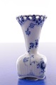Royal 
Copenhagen 
porcelain. 
Royal 
Copenhagen Blue 
fluted full 
lace. Small 
individual vase 
no. ...