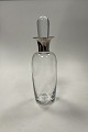 Holmegaard 
Glass Carafe in 
clear glass 
with silver 
neck