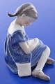 Royal 
Copenhagen 
porcelain 
figurine, Girl 
with doll no. 
400. Height 9 
cm. 1. quality, 
fine ...