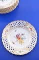 Royal 
Copenhagen 
porcelain. Hand 
painted Saxon 
flower,  Fruiet 
plate  with 
open-work 
border, ...