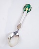 Enamel 
Christmas Spoon 
made of 
sterling 
silver, made by 
Grann & Laglye 
in 1953. The 
Christmas ...