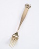 This 
commemorative 
fork was made 
in sterling 
silver by Anton 
Michelsen on 
the occasion of 
...