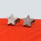 Ole Lynggaard; A pair of star ear rings in 18k white gold, each set with a brillant-cut diamond, ...