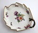 Royal 
Copenhagen. 
Saxon flower. 
Leaf shaped 
pickle dish. 
Model 1599. 
Length 23.5 cm. 
Produced ...