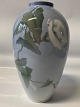 Royal 
Copenhagen Vase 
with Flowers.
Height.: 22 
cm.
Factory 
Second.
Decoration 
number: ...