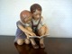 Fantastic Dahl 
Jensen 
Figurine. Two 
children 
reading. It has 
incrediable, 
lifelike colors 
and ...