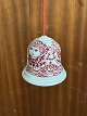 Christmas bell 
with red 
decoration 
designed by 
Bjørn Wiinblad. 
The artist's 
signature is 
seen ...