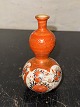 Gourd-shaped 
vase in 
porcelain with 
floral 
decoration. 
Made in Japan 
in the early 
20th century. 
...
